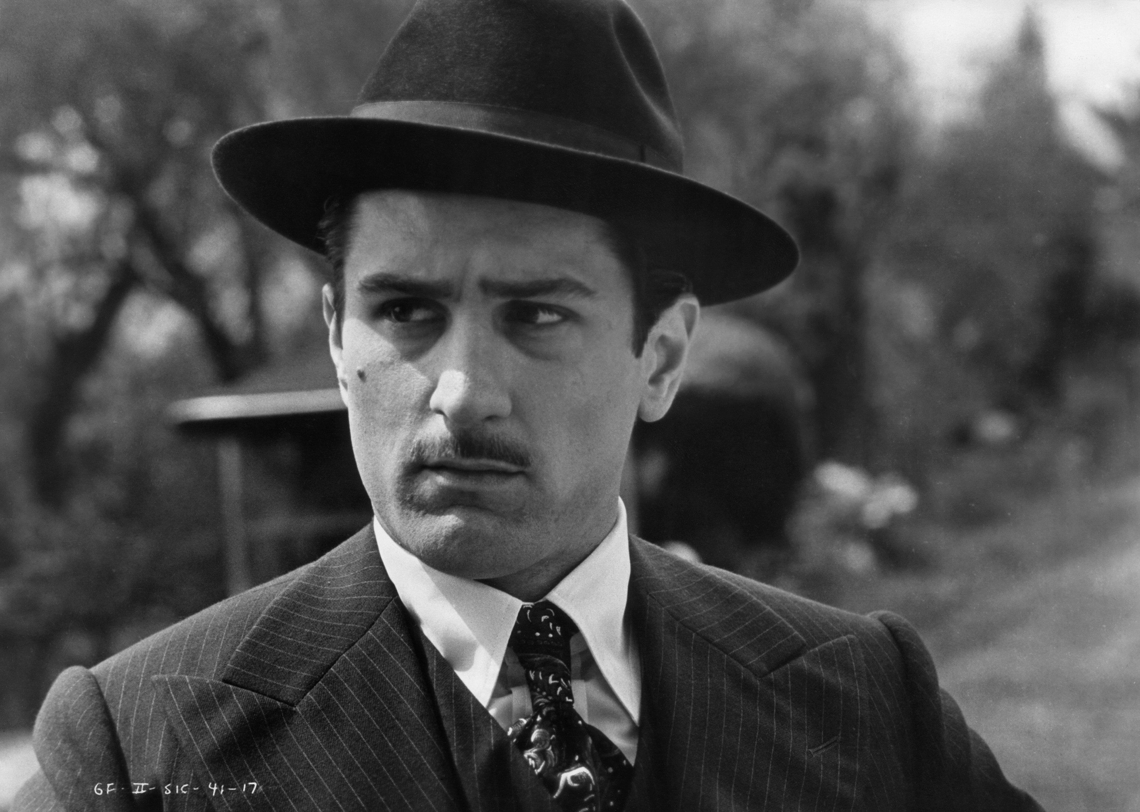 NEW YORK - 1974: Robert De Niro performs a scene in The Godfather Part II directed by Francis Ford Coppola in 1974 in New York, New York. (Photo by Michael Ochs Archive/Getty Images)